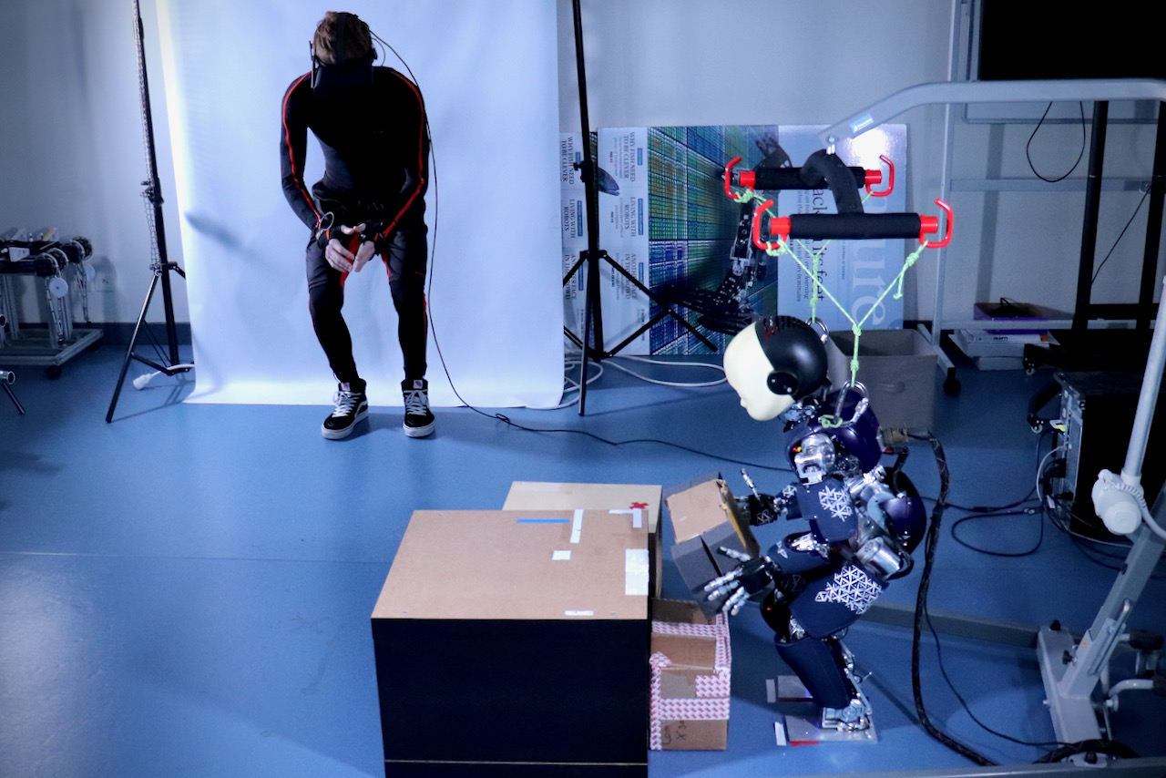 Teleoperation of the iCub robot. The operator wears a motion capture suit and a virtual reality helmet. We optimize the parameters and the structure of the controller with a multi-objective optimization algorithm.