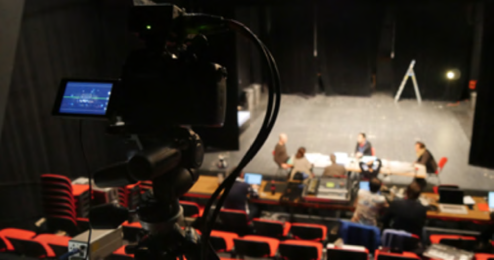 KinoAI uses a single ultra high resolution, wide-angle camera to produce a large variety of shots, which are used to create audiovisual notebooks docuemnting the creative process of theater rehearsals.