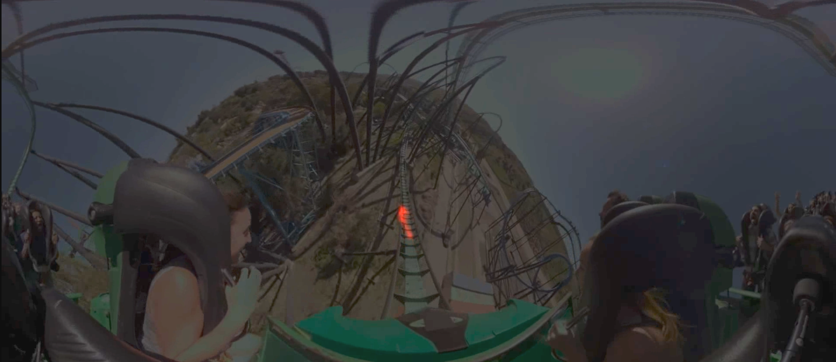 On the still image of a roller coaster video, we see at the center a red scan path indicating a high arousal as the ride decends into a dive.